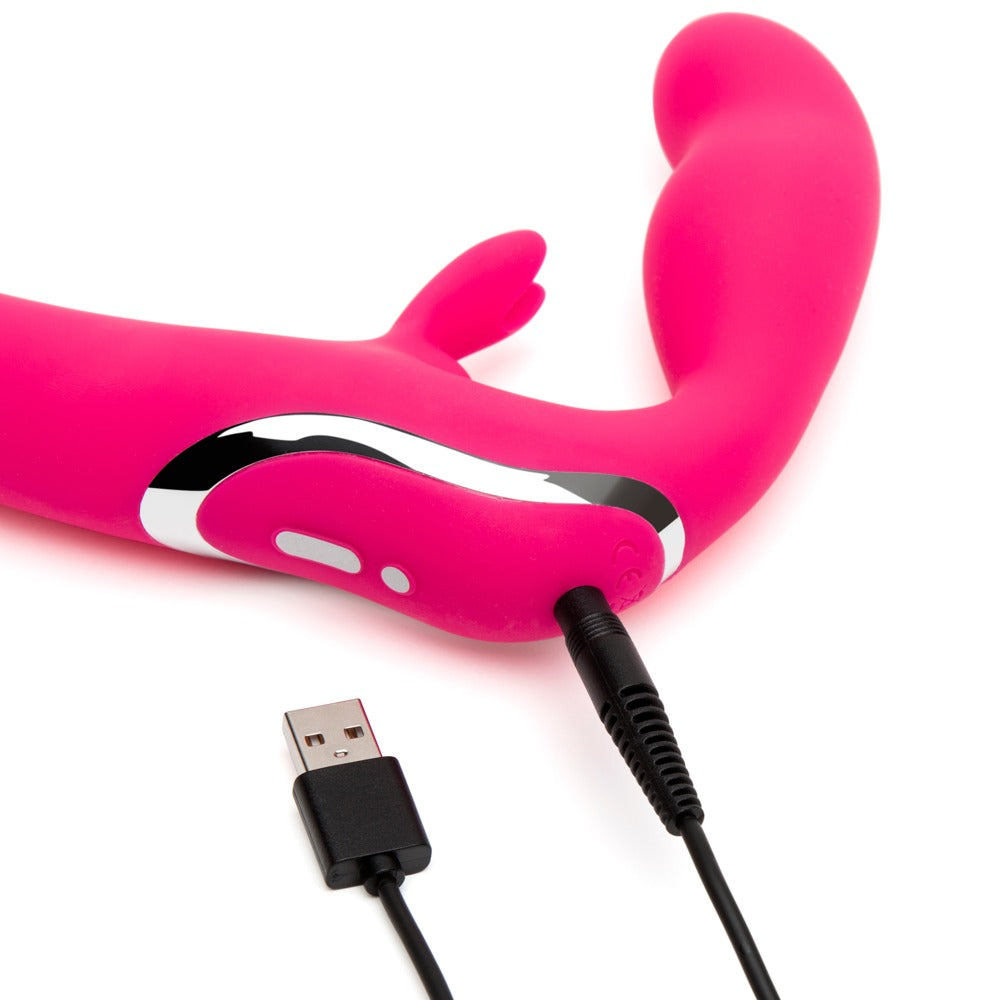Happy Rabbit Strapless Strap-On in Pink mit USB-Ladekabel zur Darstellung der wiederaufladbaren Funktion