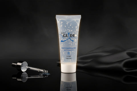 Just Glide wasserbasiertes Gleitgel in transparenter Verpackung