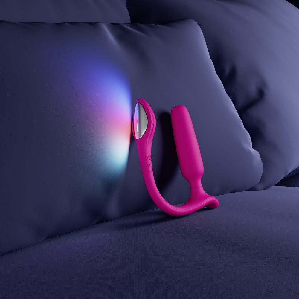 Lovense Lush Anal mit leuchtenden LED-Effekten in stimmungsvoller Umgebung
