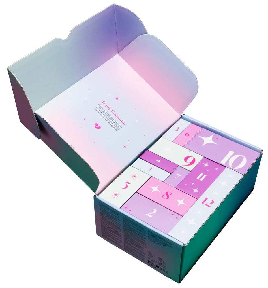 Geöffneter Magic Shiver Enjoy Erotik-Adventskalender 2026 mit den einzelnen Geschenkboxen im Pastell-Design