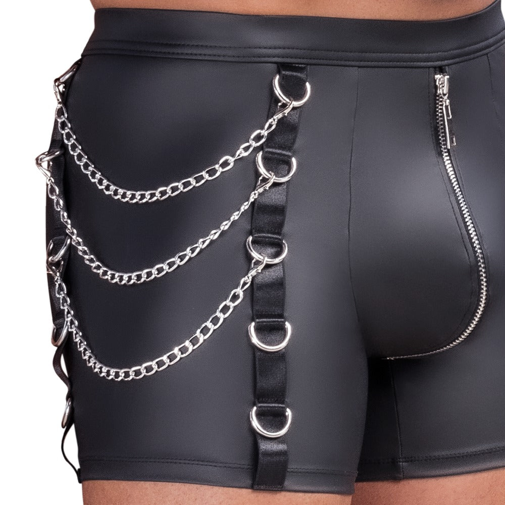 Detail der NEK Pants im schwarzen Mattlook mit Front-Zip, Metallringen und drei Karabiner-Ketten