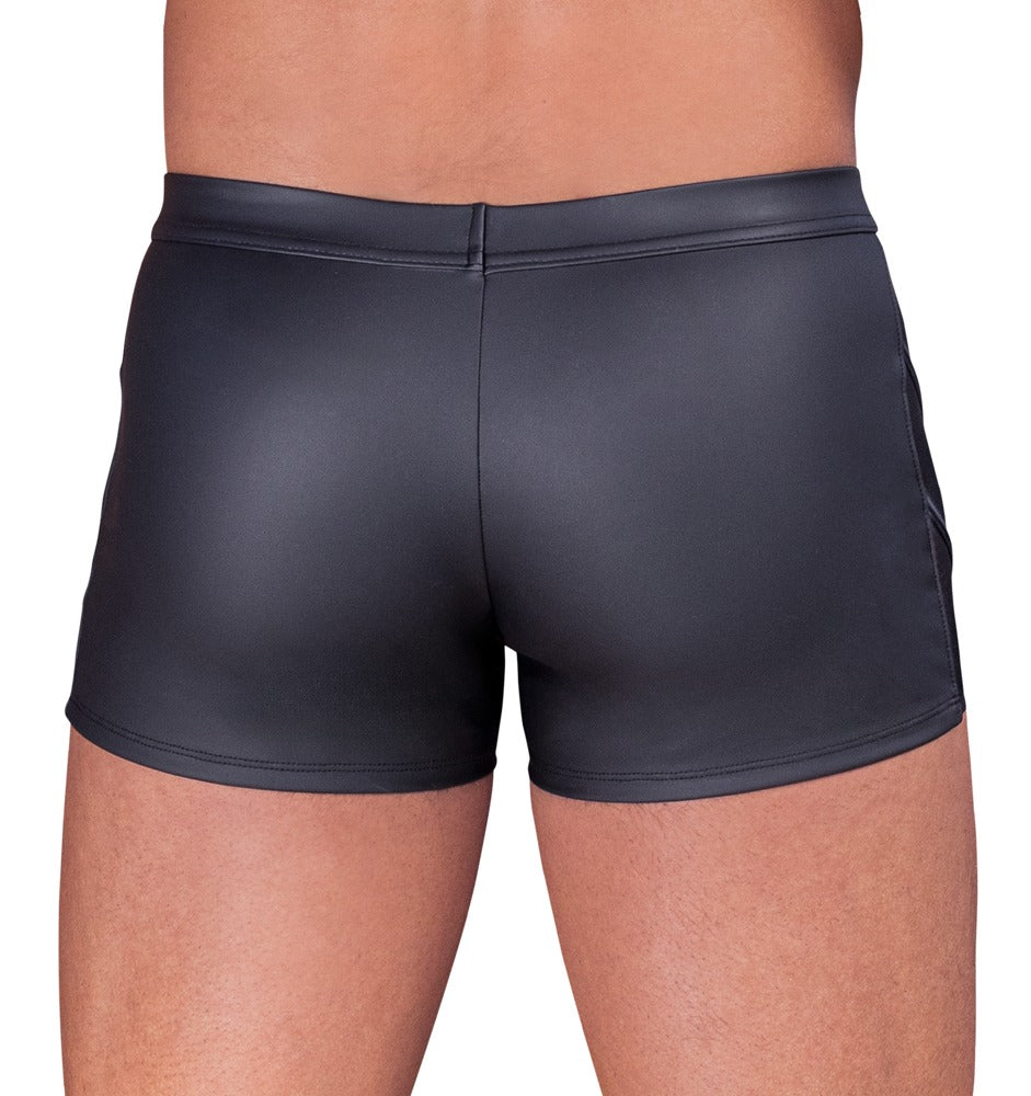 Rückansicht der körperbetonten NEK Pants am Model im schwarzen Mattlook