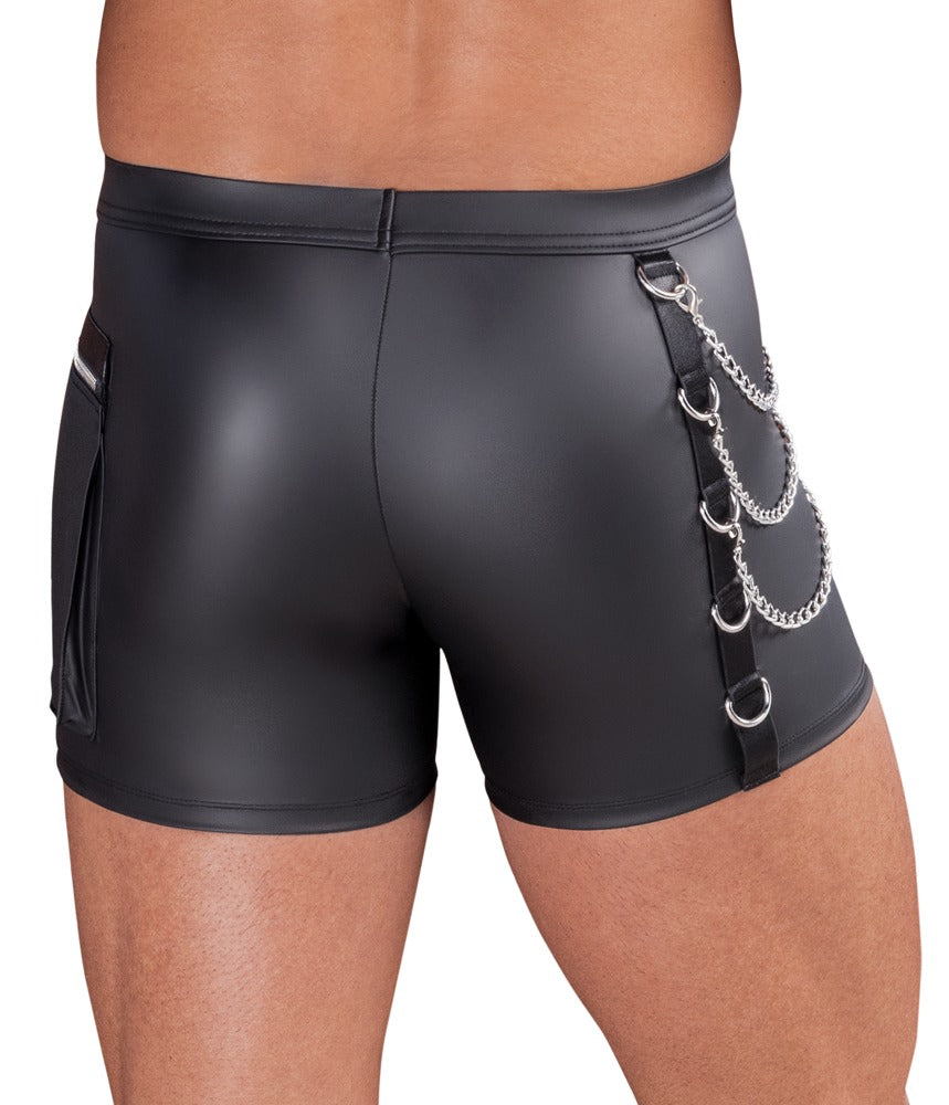 Rückansicht der körperbetonten NEK Pants am Model mit schwarzem Mattlook und seitlichen Metallringen
