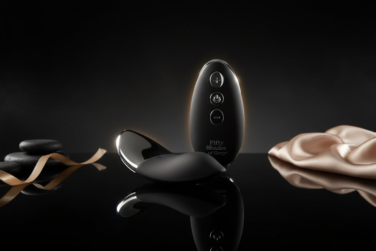 Auflegevibrator mit Fernbedienung in elegantem schwarzem Design mit silbernen Details