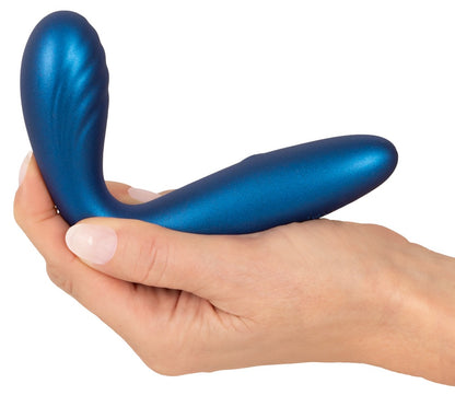 Sweet Smile Flexible G-Spot G-Punkt-Vibrator in Blau – Produktansicht in einer Hand zur Darstellung der flexiblen und ergonomisch gebogenen Form