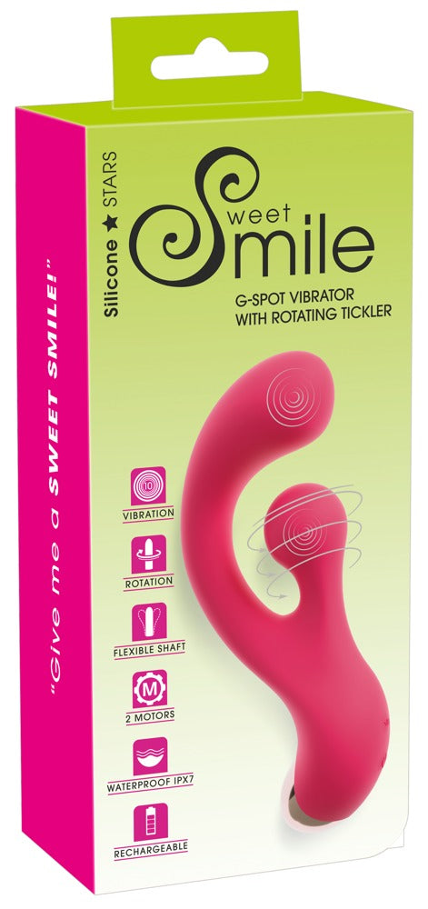 Sweet Smile Rabbit Vibrator mit Klitoris-Rotation – Produktansicht zusammen mit der pink-grünen Sweet Smile Verpackung