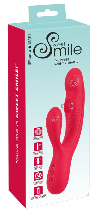 Sweet Smile Thumping Rabbit Vibrator mit Klopffunktion in Rot – Produktansicht zusammen mit der weiß-türkisen Sweet Smile Verpackung