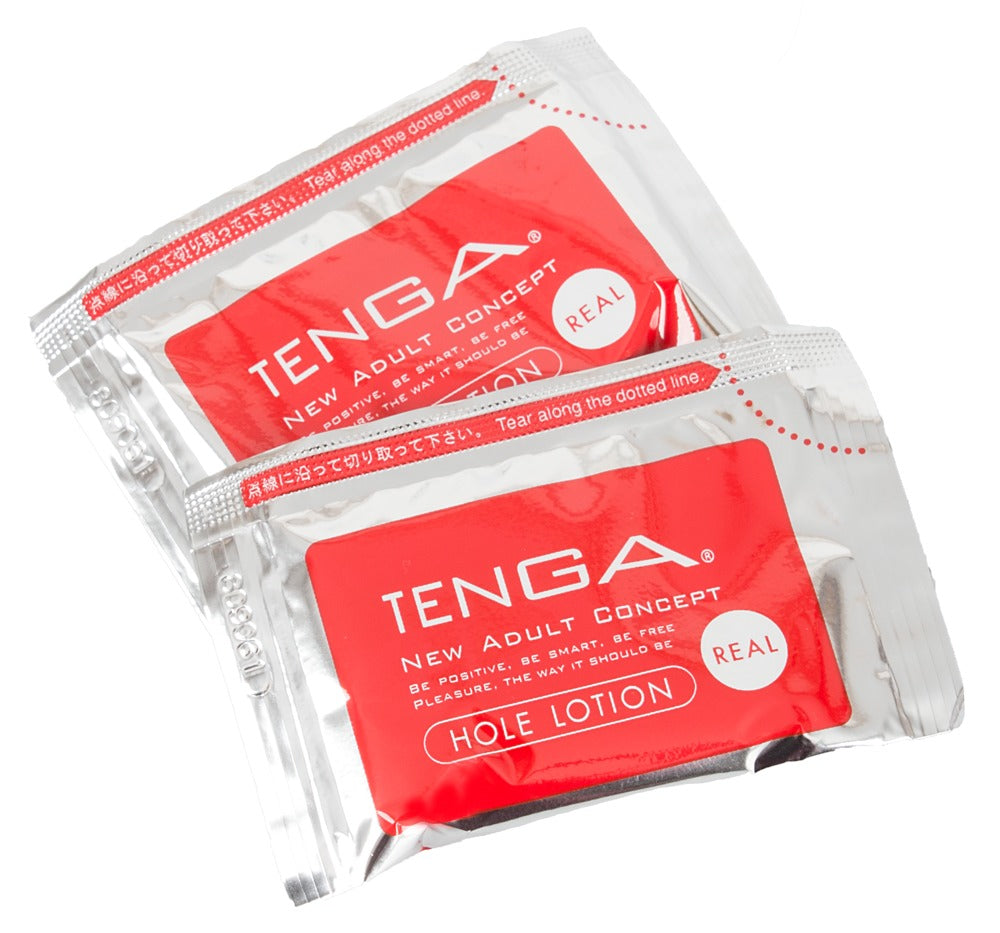 Zubehör des Tenga Flip Zero mit Gleitgel-Sachets und hochwertiger Verpackung für ein sofortiges Anwendungserlebnis