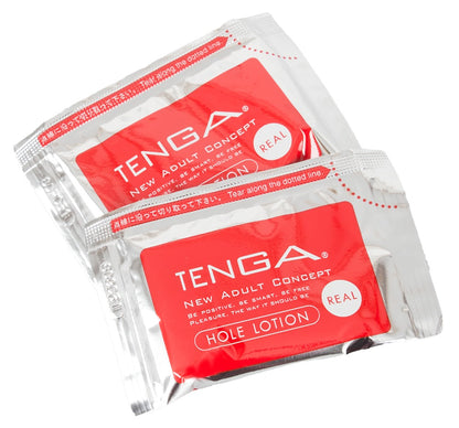 Zubehör des Tenga Flip Zero mit Gleitgel-Sachets und hochwertiger Verpackung für ein sofortiges Anwendungserlebnis