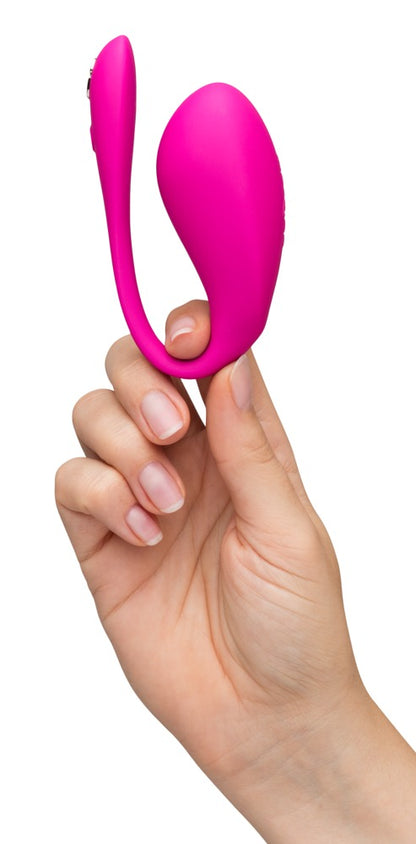 We-Vibe Jive 2 Vibro-Ei in Pink in einer Hand gehalten