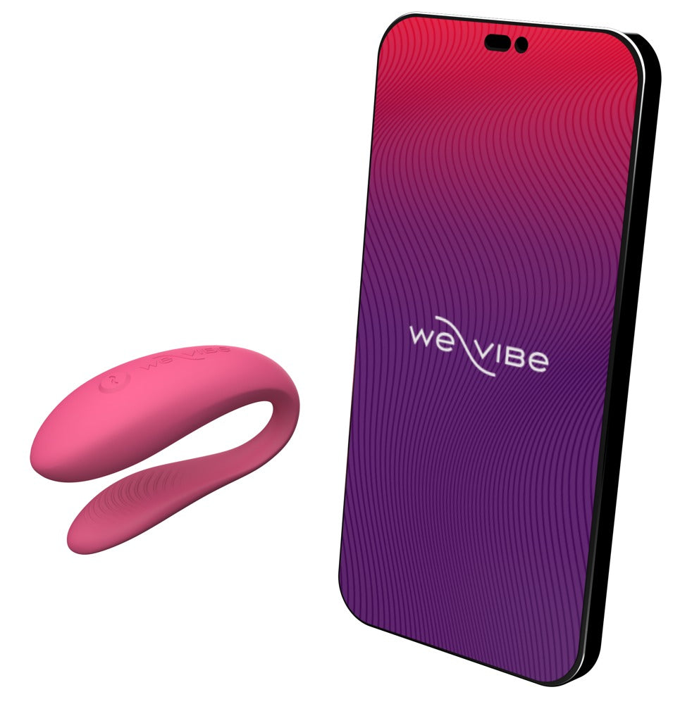 Pinker We-Vibe Sync Lite neben Smartphone mit We-Vibe App
