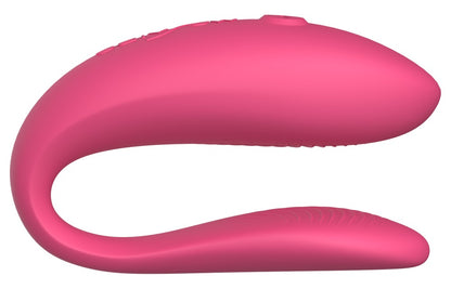 Seitenansicht des pinken We-Vibe Sync Lite Paarvibrators