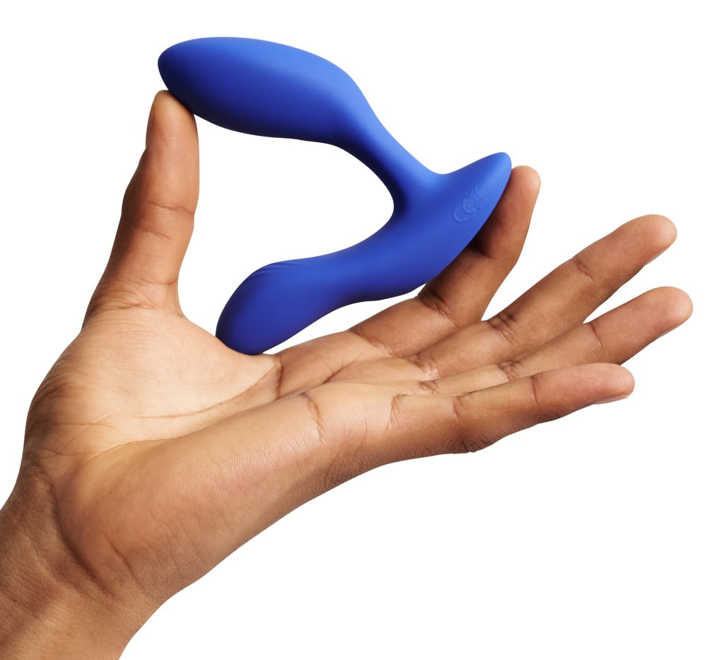 We-Vibe Vector+ in einer Hand zur Darstellung der Produktgröße