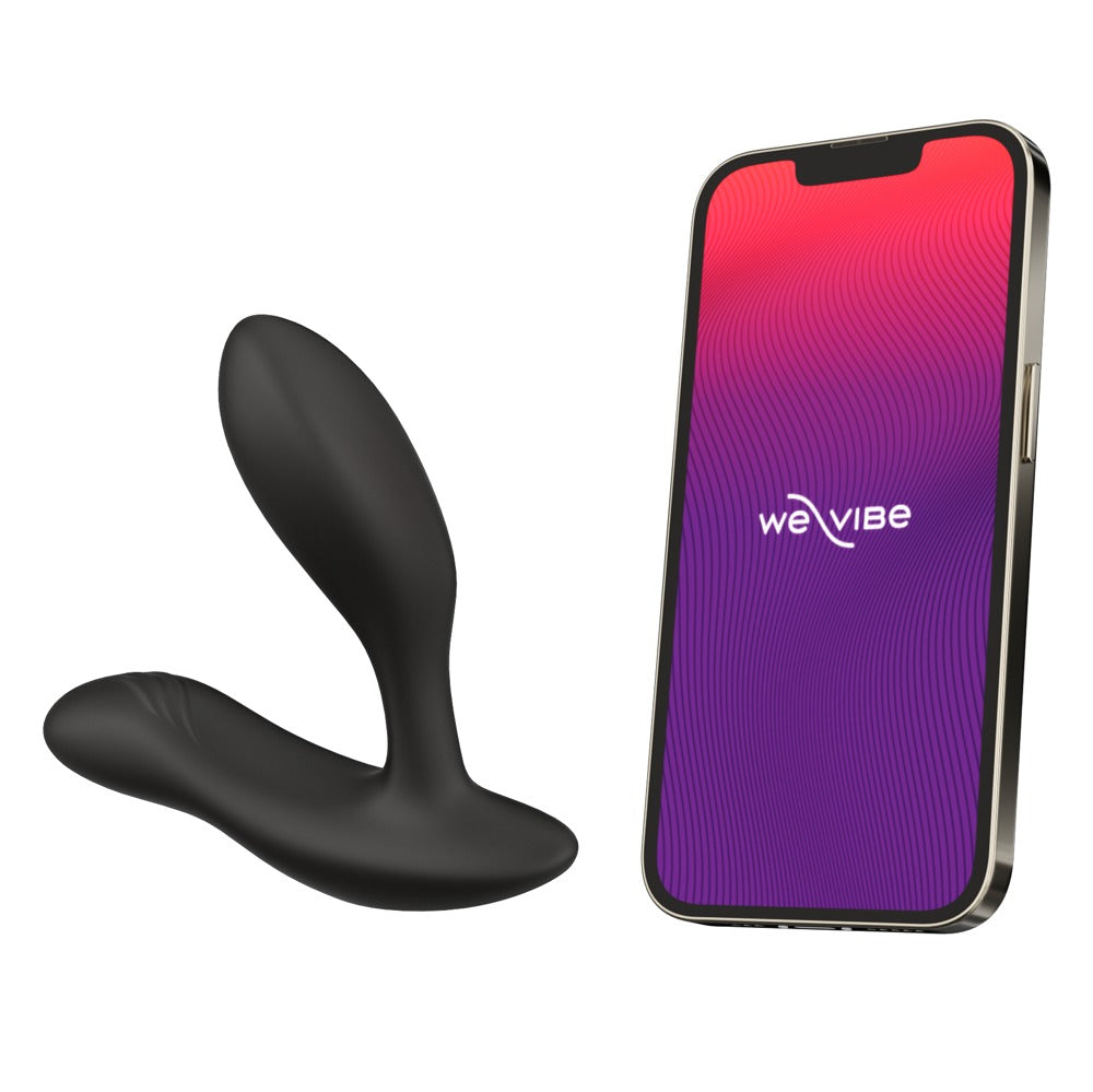 Schwarzer We-Vibe Vector+ neben Smartphone mit We-Vibe App