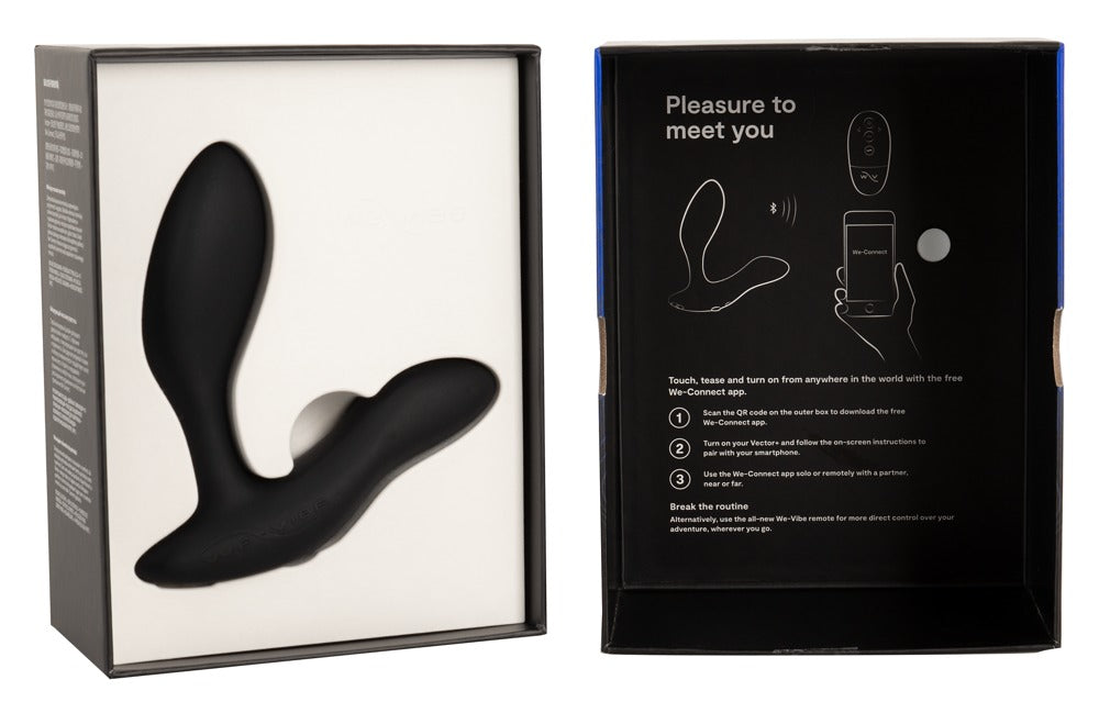 Geöffnete Verpackung des schwarzen We-Vibe Vector+ mit Zubehör