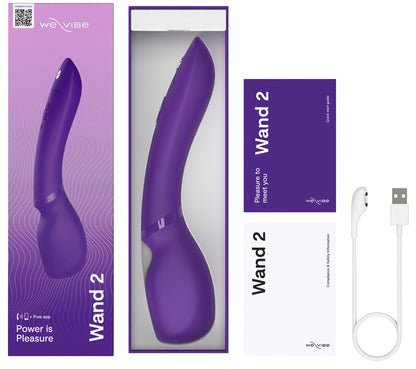Lieferumfang des We-Vibe Wand 2 Massagestabs in Pink mit Zubehör und Produktverpackung