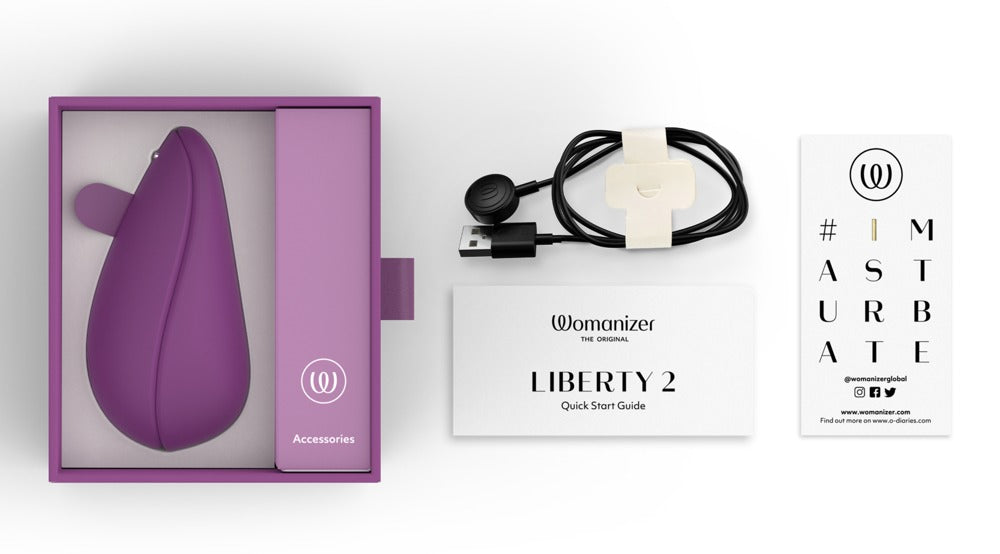 Womanizer Liberty 2 Druckwellenvibrator Lieferumfang mit USB Ladekabel und Magnet Cover