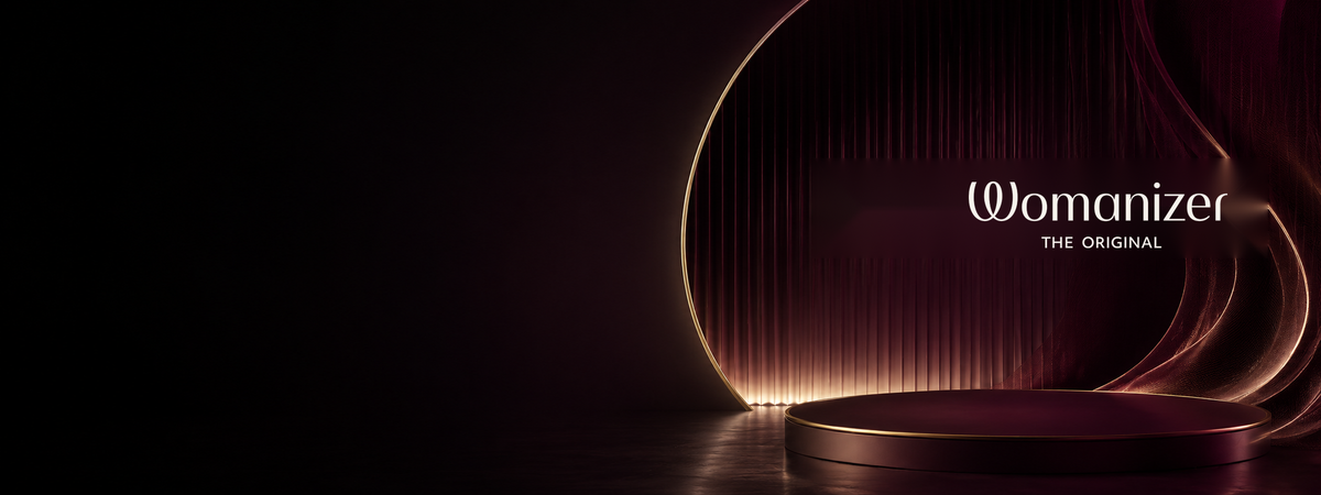 Womanizer Markenwelt in dunklem Bordeaux und Gold bei Evoria Care