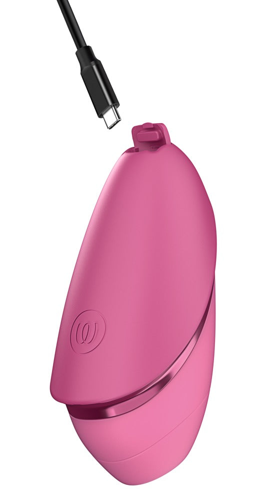 Womanizer Next Liberty in Pink mit angeschlossenem USB-C-Ladekabel