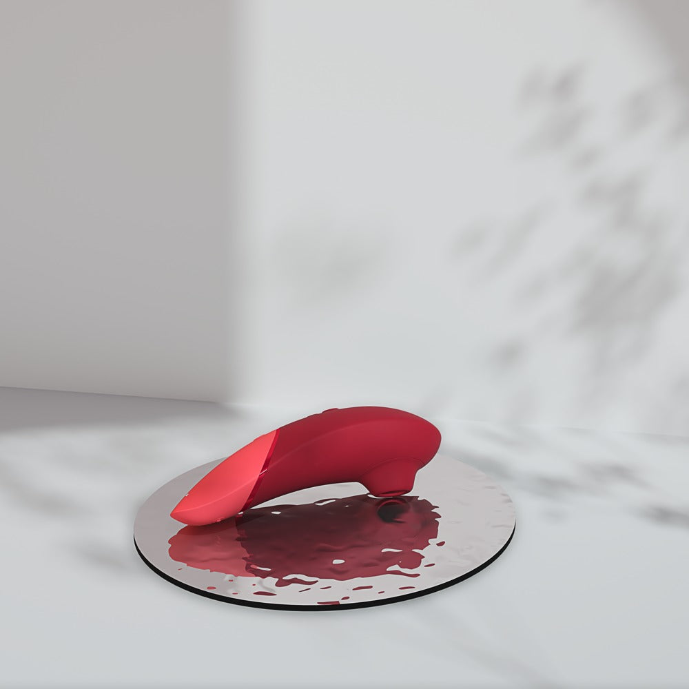 Womanizer Next Sensual Collection auf elegantem Untergrund mit luxuriöser Atmosphäre
