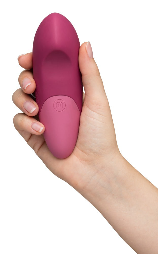Ergonomischer Womanizer Vibe Vibrator in der Hand