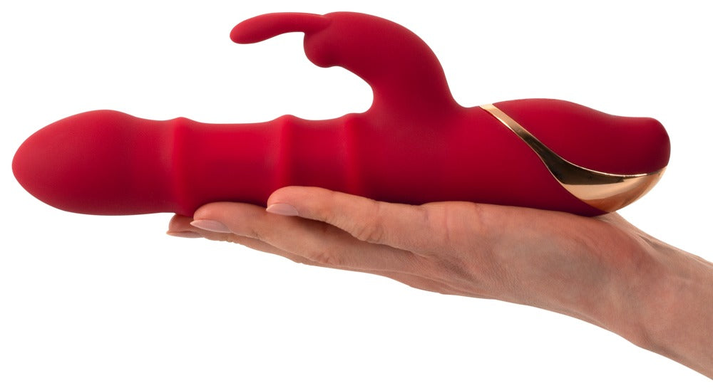 You2Toys Rabbit Vibrator mit 3 Moving Rings Größenvergleich in der Hand