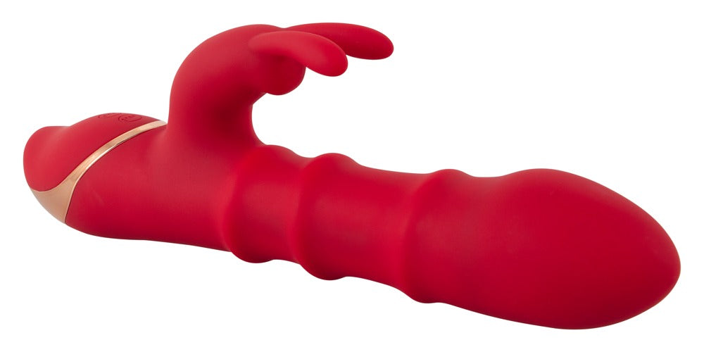You2Toys Rabbit Vibrator mit 3 Moving Rings in liegender Ansicht