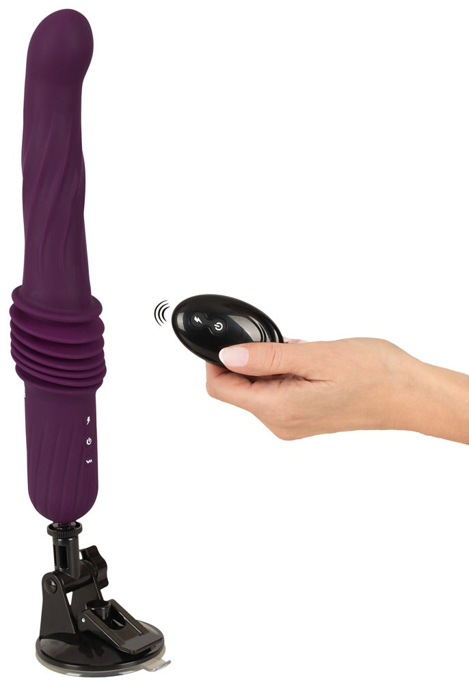Stoßvibrator mit befestigtem Saugfuß und Fernbedienung